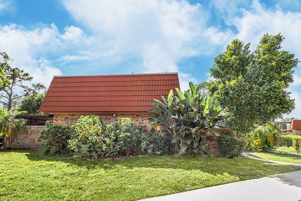 Photo of 4740 Suburban Pines Drive, Greenacres, FL 33463 (MLS # B26023065)