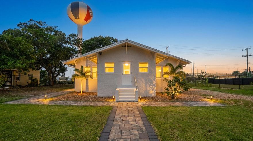 Live in 1 unit & RENT the REST! Positive Cash flow from the day you close!! Already a completed 4 pt inspection performed for the fussy lenders whether you're doing a conventional loan,  FHA loan, etc. move in with low down payment! Don't miss this versatile property with multiple living spaces and income potential—no HOA! The main home features 2 bedrooms and 2 baths with a desirable split floor plan and a private primary suite. An attached 1 bed / 1 bath unit with its own entrance offers ideal space for guests or extended family, while a separate studio apartment (1/1) above the two-car garage adds even more flexibility for a home office or rental income.  A strong opportunity for homeowners or investors alike, with potential to generate solid returns. Inside, you'll find timbered, painted volume ceilings, a wood-burning fireplace, and classic Dade County pine wood floors. The updated kitchen includes stainless steel appliances and granite countertops. Generously sized bedrooms and a large yard with plenty of room to roam make this home perfect for both living and entertaining.