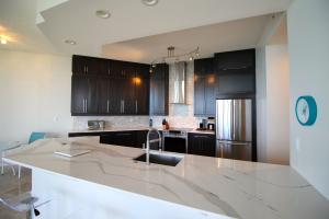 THE ATRIUM ON THE OCEAN, A CONDOMINIUM - Residential