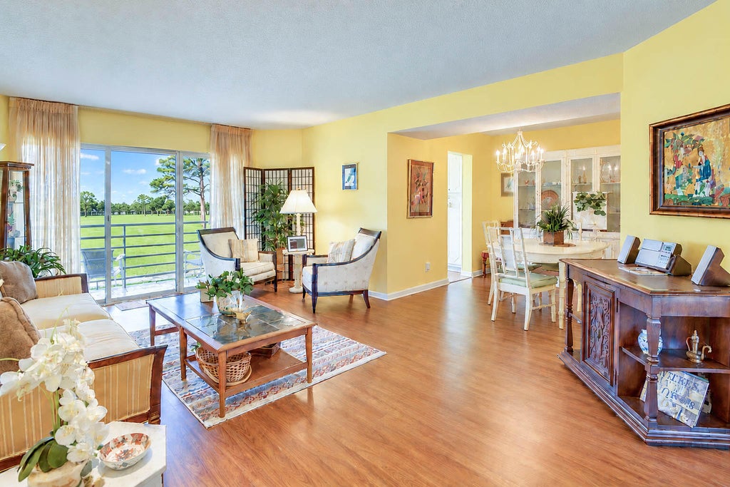 Photo of 3755 VIA POINCIANA #402, Lake Worth, FL 33467 (MLS # B26080831)