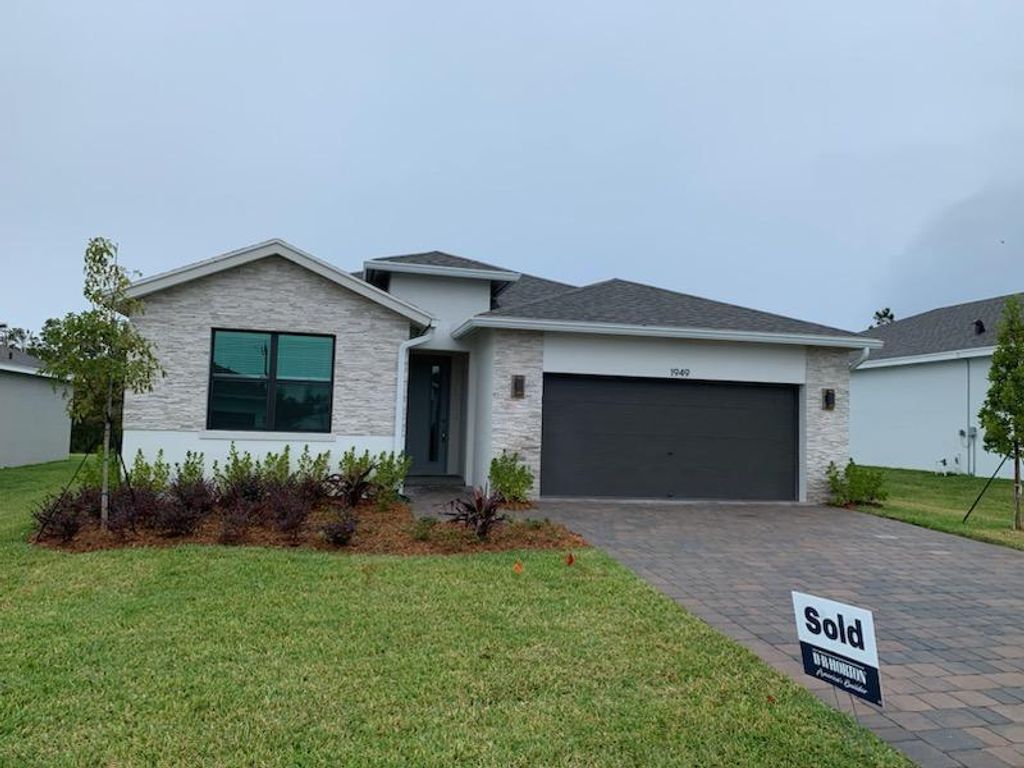 Photo of 1949 NE Ocean Dunes Drive, Jensen Beach, FL 34957 (MLS # R10947373)
