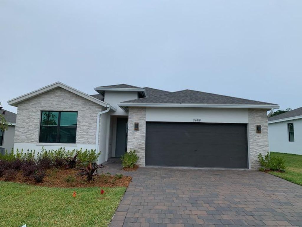 Photo of 1949 NE Ocean Dunes Drive, Jensen Beach, FL 34957 (MLS # R10947373)
