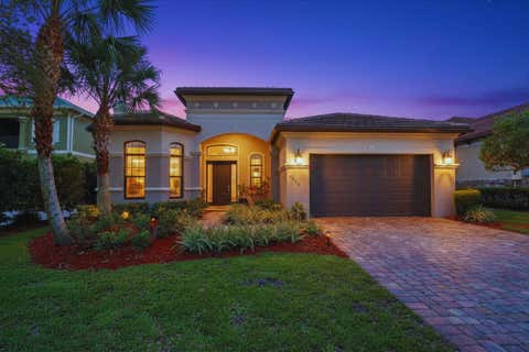 Photo of 1042 NE Savanna Oaks Way, Jensen Beach, FL 34957 (MLS # B26031706)