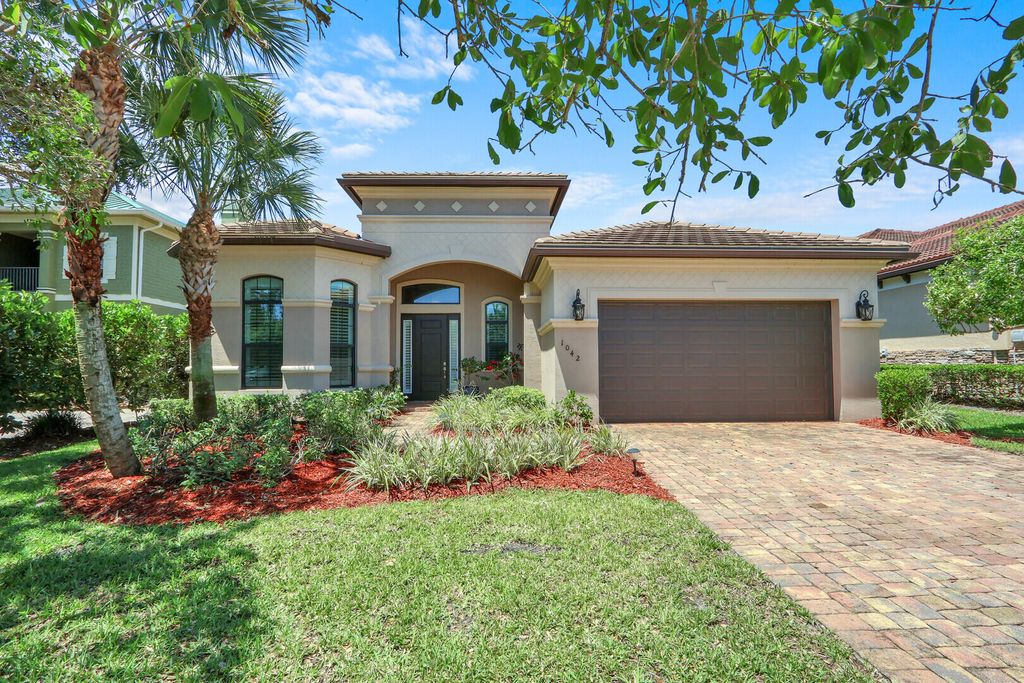 Photo of 1042 NE Savanna Oaks Way, Jensen Beach, FL 34957 (MLS # B26031706)