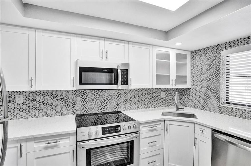 A STUNNING COMPLETELY RENOVATED, SPACIOUS 2 BED & 2 BATH CONDO IN FORT LAUDERDALE. IMPACT D/WINDOWS, STAINLESS STEEL KITCHEN APPLIANCES AND FULL WALL BACKSPLASH SURROUNDED BY MODERN WHITE SHAKER KITCHEN CABINETS TOPPED WITH QUARTZ COUNTERTOPS. NEW WOOD-LOOK PORCELAIN TILE THROUGHOUT, CAPPED WITH SQUARE BASEBOARD. BOTH BEDROOMS HAVE SLIDER MIRROR DOORS IN FRONT OF CLOSETS. MASTER BATHROOM HAS SLEEK BARN DOOR & FEATURES NEW SHOWER WITH WATER WALL FIXTURE! BATHTUB/SHOWER COMBO IN THE 2ND BATHROOM. LOTS OF CLOSET SPACE:HALL CLOSETS BUILT IN SHELVING AND HANGING RAILS. NEW AIR CONDITIONER UNIT, NEST THERMOSTAT, NEST HELLO DOORBELL. HOA INCLUDES CABLE, INTERNET. DOG PARK !! WONT LAST. 12-24HR NOTICE. USE SHOW ASSIST