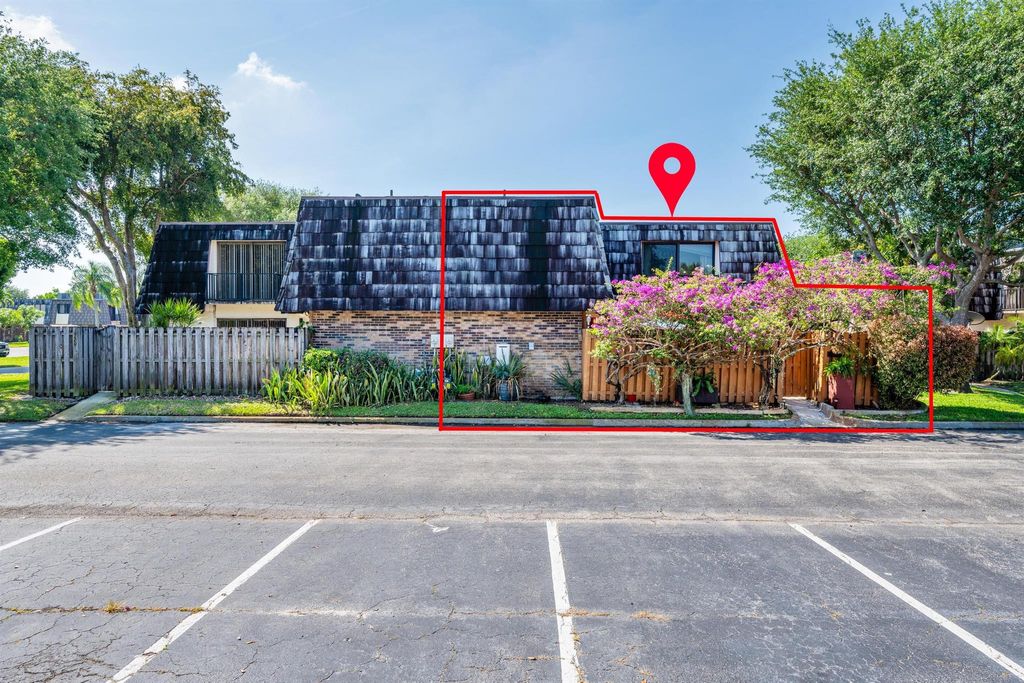 Photo of 1720 Forest Lakes Circle #D, West Palm Beach, FL 33406 (MLS # R11077331)