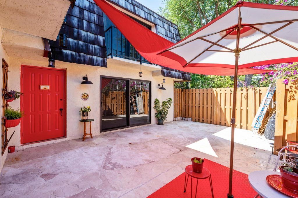 Photo of 1720 Forest Lakes Circle #D, West Palm Beach, FL 33406 (MLS # R11077331)