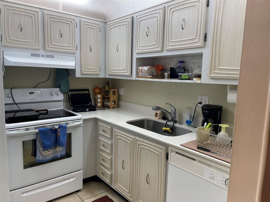 Priced to Sell!  Great quite 55+ complex.  Well maintained building and unit.  This 1st floor unit overlooks the pretty courtyard.  Enclosed screened patio for extra living space.  Full kitchen, large bathroom and good size bedroom.  abundant storage in the unit and extra storage in the storage room.  This community amenities include a heated pool, pickleball and tennis courts, fitness center, BBQ area, shufleboard and more. Oakland Park Blvd to Somerset Dr.  Past guard gate take 1st right bldg. is the 1st one on your left.