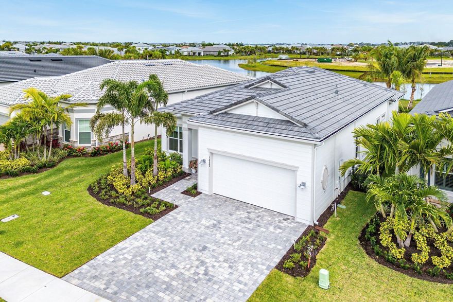 Seller offers attractive financing on this exceptional brand-new furnished waterfront home in Palm Beach Gardens. Qualified buyers may take advantage of 4% interest financing for up to 18 months with 20% down, creating a rare opportunity to secure a luxury waterfront property with favorable terms.  Located in the highly sought-after Avenir community., this new construction designer residence is professionally furnished and completely move in ready Featuring 3 spacious bedrooms plus a versatile den  can that serve as office , playroom, or forth bedroom, the bright open-concept floor plan is ideal for everyday living and entertaining.  Enjoy the tranquil water views, sophisticated interiors, and seamless indoor-outdoor living with screened Lanai.  . Every detail has been completed with televisions installed, lightning in place, and beautifully appointed bedrooms ready for immediate occupancy.  Residents enjoy one of the area's most desirable new neighborhoods with outstanding amenities including tennis, pickleball, clubhouse lifestyle, and the modern appeal that has made Avenir one of the top destinations in Palm Beach Gardens