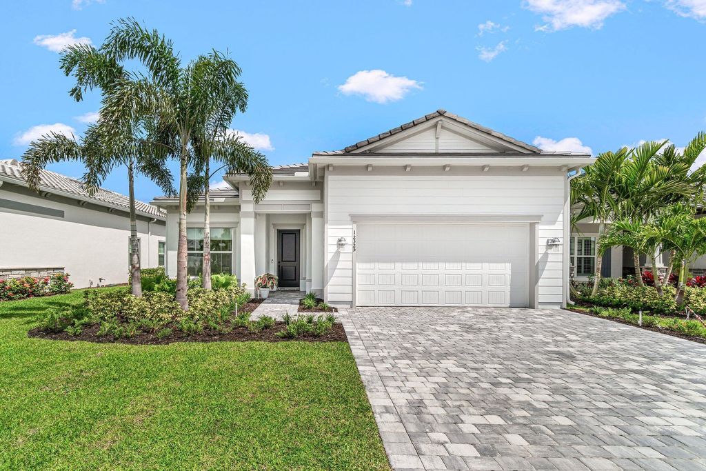 Photo of 12325 Frontline Lane, Palm Beach Gardens, FL 33412 (MLS # B26019969)