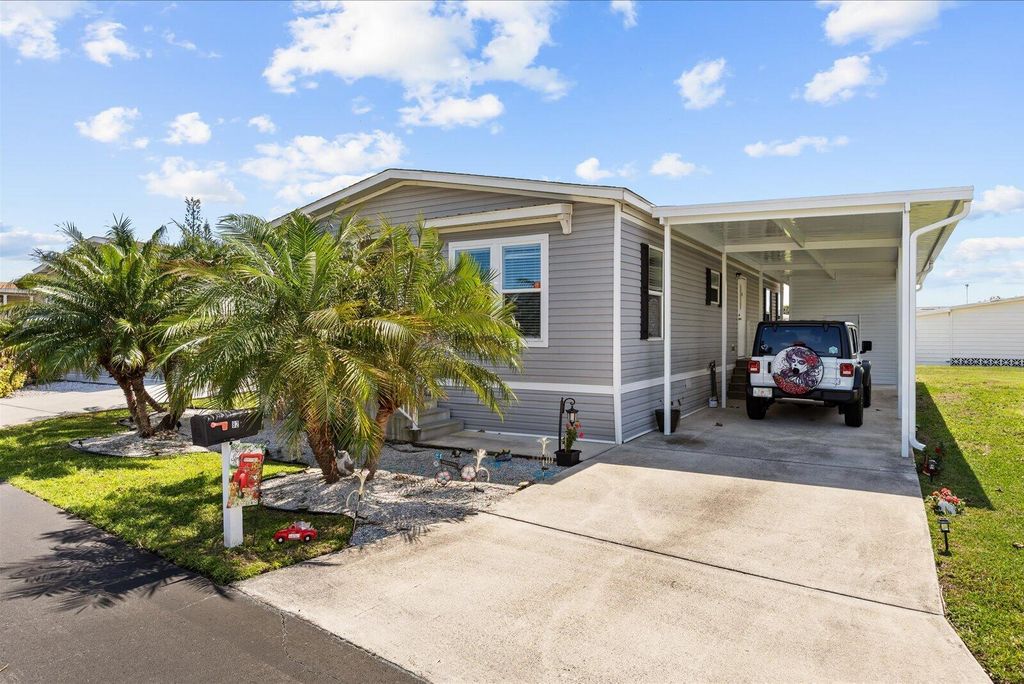 Photo of 82 Sandhill Boulevard, Fort Pierce, FL 34982 (MLS # B26004699)