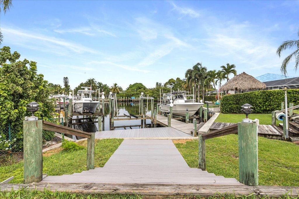 Photo of 37 SW Riverway Boulevard, Palm City, FL 34990 (MLS # R11003564)