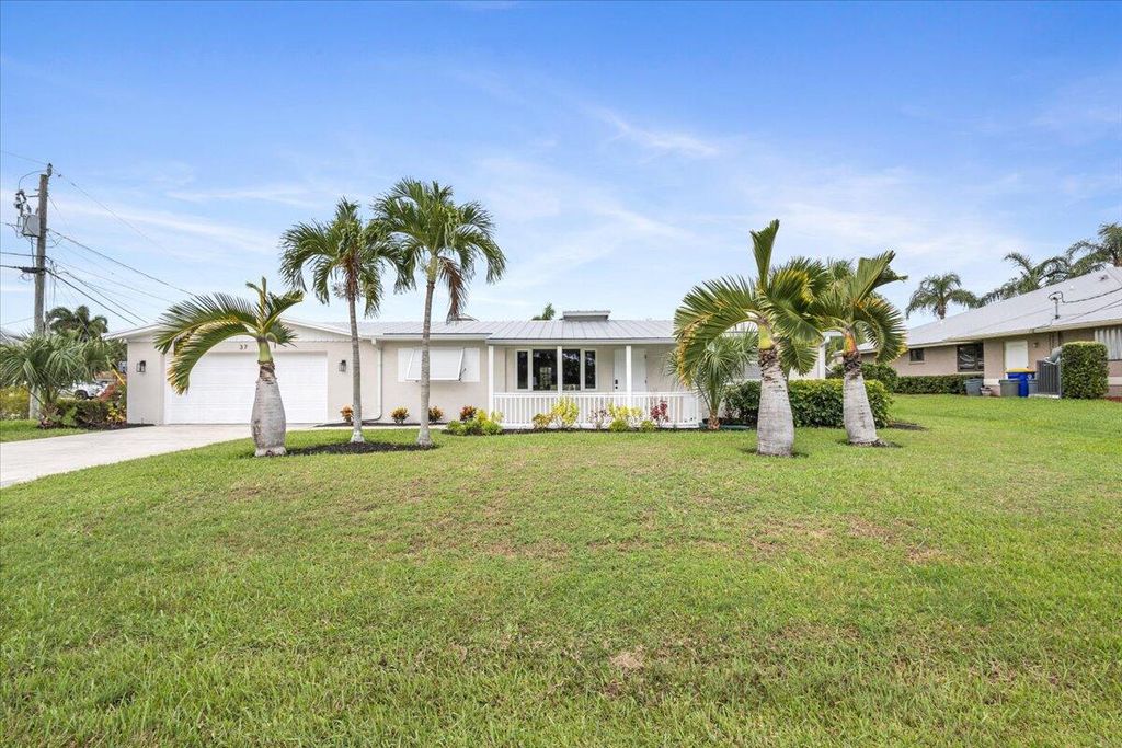 Photo of 37 SW Riverway Boulevard, Palm City, FL 34990 (MLS # R11003564)