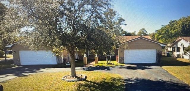 VERY RARE DUPLEX ON A OVERSIZED CORNER LOT W/2 CAR GARAGE ON EACH SIDE* IMPACT GLASS THROUGHOUT* BOTH SIDES HAVE HUGE FENCED YARDS* AS PER INSPECTION JAN/2015 ROOF HAD 16 YEARS LEFT*LEAK FREE TODAY* A/C UNITS APPROX 5 YRS NEW* REMODELED WITH NEW APPLIANCES (AUG-SEPT 2024) ON THE NORTH SIDE* REMODELED SOUTH SIDE WITH NEW AND NEWER APPLIANCES*FULL SIZE WASHER/DRYERS IN BOTH UNITS*CIRCULAR DRIVE WITH SEPERATE ROOM FOR MUTIPLE CARS ON BOTH SIDES* LOT SIZE BETWEEN 1/4 AND 1/2 ACRE* STORAGE ROOMS* ELECTRICAL PANELS HAVE BEEN REPLACED*BOTH SIDES LEASED AT $3,200 & $3,500 PER/M* CLOSE TO SCHOOLS,PARKS,SHOPPING,TRANSPORTATION,COMMUNITY POOLS,RESTURANTS AND LIBRARY*