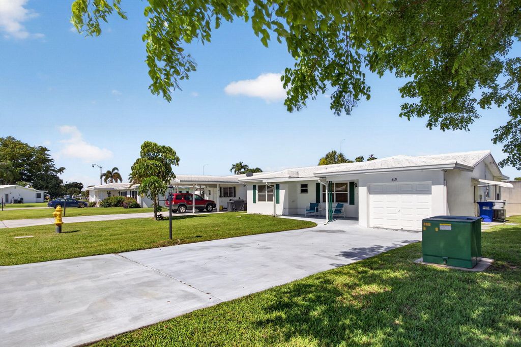Photo of 3121 E Golf Boulevard, Pompano Beach, FL 33064 (MLS # B26027480)