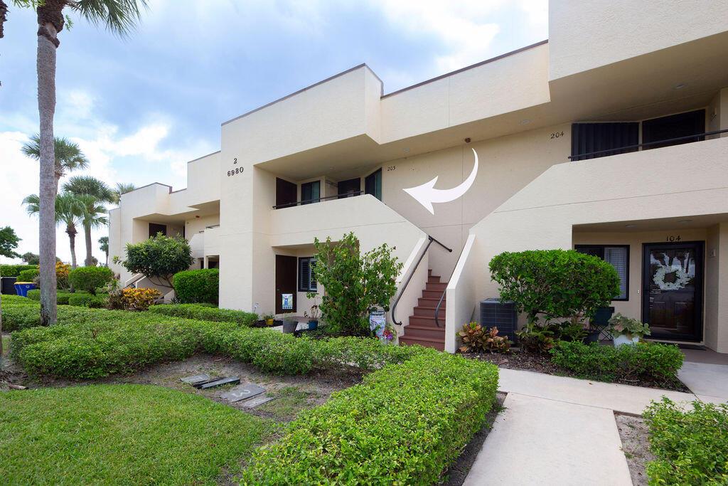 This beautifully updated 2-bedroom, 2-bath condo offers modern style and comfort with a prime location on the 5th hole of a lush, well-maintained golf course. Enjoy sweeping fairway and lake views right from your private balcony or living room. Step inside to find an open, light-filled floor plan, upgraded kitchen with stainless steel appliances, granite countertops, and sleek cabinetry. Both bedrooms are generously sized, with the primary suite featuring an en-suite bath and custom California walk-in closets. The home is enhanced with impact windows for peace of mind and plantation shutters for timeless elegance. Enjoy the tennis and Pickleball courts along with the clubhouse for social events and BBQ's.