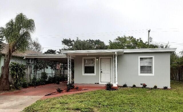 A welcoming home located in a friendly neighborhood on a quiet dead-end street. Freshly painted with tile and wood flooring throughout the home. Cozy sunroom and a spacious laundry room, with dryer/washer hookup available.