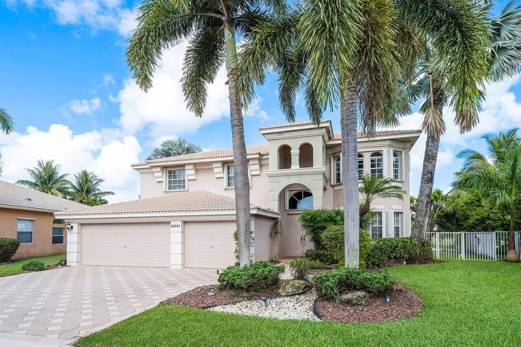 Photo of 6441 Marbletree Lane Ln, Lake Worth Beach, FL 33467 (MLS # R10820860)