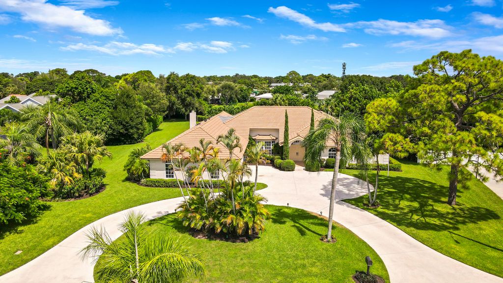 Photo of 109 SE Turtle Creek Drive, Tequesta, FL 33469 (MLS # R10912735)