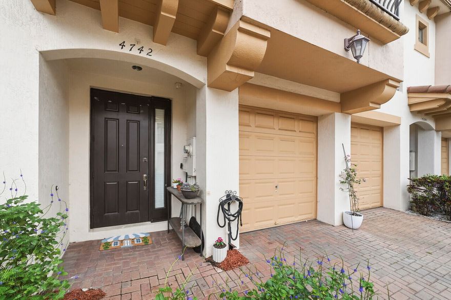 Step into this beautifully maintained 3-bedroom, 2.5-bathroom residence nestled in the sought-after community of Coconut Creek. This inviting home offers a perfect blend of comfort and style, featuring a spacious open floor plan designed for both everyday living and effortless entertaining.  The kitchen is thoughtfully appointed with ample cabinetry, sleek countertops, and a functional layout that flows seamlessly into the main living and dining areas. Natural light pours in, highlighting the home's warm and welcoming atmosphere.  The primary suite provides a relaxing retreat with generous closet space and a well-appointed en-suite bathroom featuring dual sinks, a separate shower, and a soaking tub. Additional bedrooms offer flexibility for guests, a home office, or growing families. Head outside to enjoy your private outdoor space. Ideal for morning coffee, weekend gatherings, or simply unwinding in the South Florida sunshine. A two-car garage provides ample space for parking and additional storage, adding both convenience and functionality to the home.   Located in a desirable neighborhood, residents enjoy access to community amenities, including a resort-style community pool, and a convenient location close to shopping, dining, parks, and major roadways. This property is also just a 5-minute drive from Promenade at Coconut Creek, an upscale open-air lifestyle center offering over 50 stores, a variety of restaurants, and Silverspot Cinema.  Experience easy, comfortable living in the heart of Coconut Creek, this is a place you'll be proud to call home.