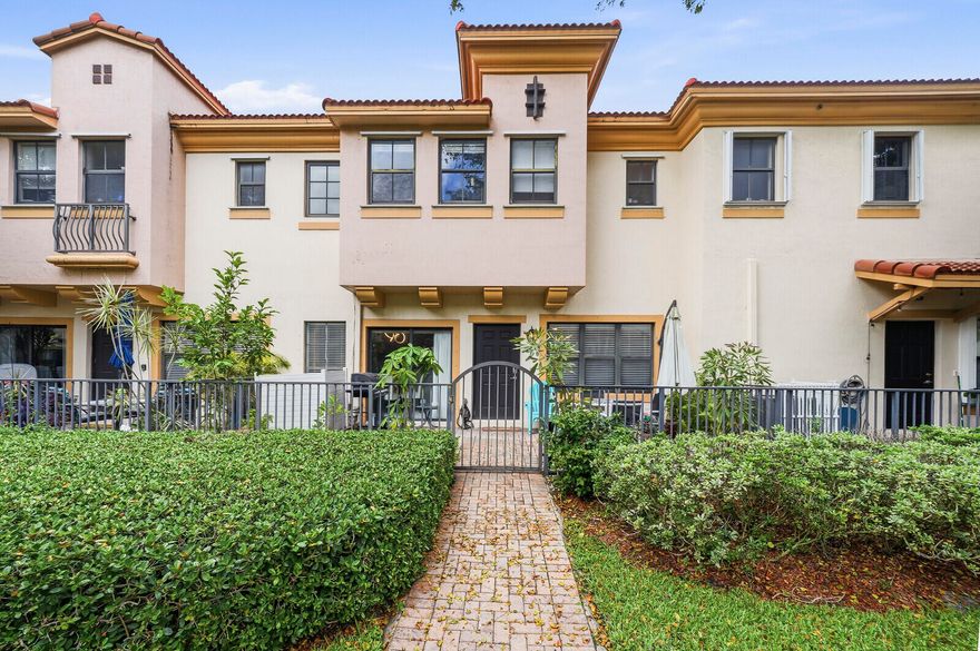 Step into this beautifully maintained 3-bedroom, 2.5-bathroom residence nestled in the sought-after community of Coconut Creek. This inviting home offers a perfect blend of comfort and style, featuring a spacious open floor plan designed for both everyday living and effortless entertaining.  The kitchen is thoughtfully appointed with ample cabinetry, sleek countertops, and a functional layout that flows seamlessly into the main living and dining areas. Natural light pours in, highlighting the home's warm and welcoming atmosphere.  The primary suite provides a relaxing retreat with generous closet space and a well-appointed en-suite bathroom featuring dual sinks, a separate shower, and a soaking tub. Additional bedrooms offer flexibility for guests, a home office, or growing families. Head outside to enjoy your private outdoor space. Ideal for morning coffee, weekend gatherings, or simply unwinding in the South Florida sunshine. A two-car garage provides ample space for parking and additional storage, adding both convenience and functionality to the home.   Located in a desirable neighborhood, residents enjoy access to community amenities, including a resort-style community pool, and a convenient location close to shopping, dining, parks, and major roadways. This property is also just a 5-minute drive from Promenade at Coconut Creek, an upscale open-air lifestyle center offering over 50 stores, a variety of restaurants, and Silverspot Cinema.  Experience easy, comfortable living in the heart of Coconut Creek, this is a place you'll be proud to call home.