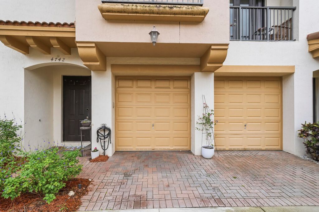 Photo of 4742 Grand Cypress Circle N, Coconut Creek, FL 33073 (MLS # B26018551)