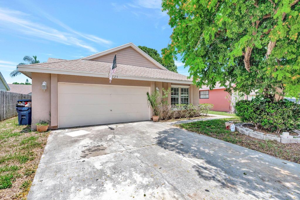 Photo of 1225 Arapaho Street, Jupiter, FL 33458 (MLS # R11106254)