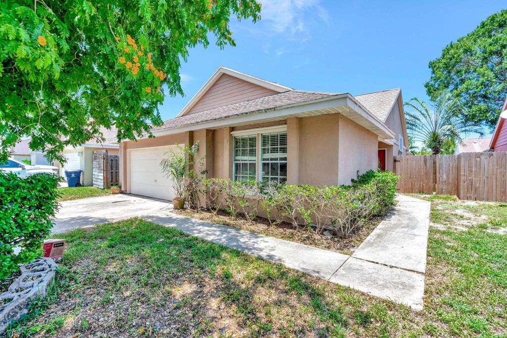 Photo of 1225 Arapaho Street, Jupiter, FL 33458 (MLS # R11106254)