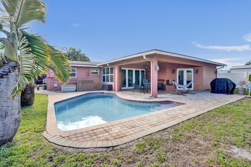 Photo of 7671 NW 15th Court, Pembroke Pines, FL 33024 (MLS # F10549501)