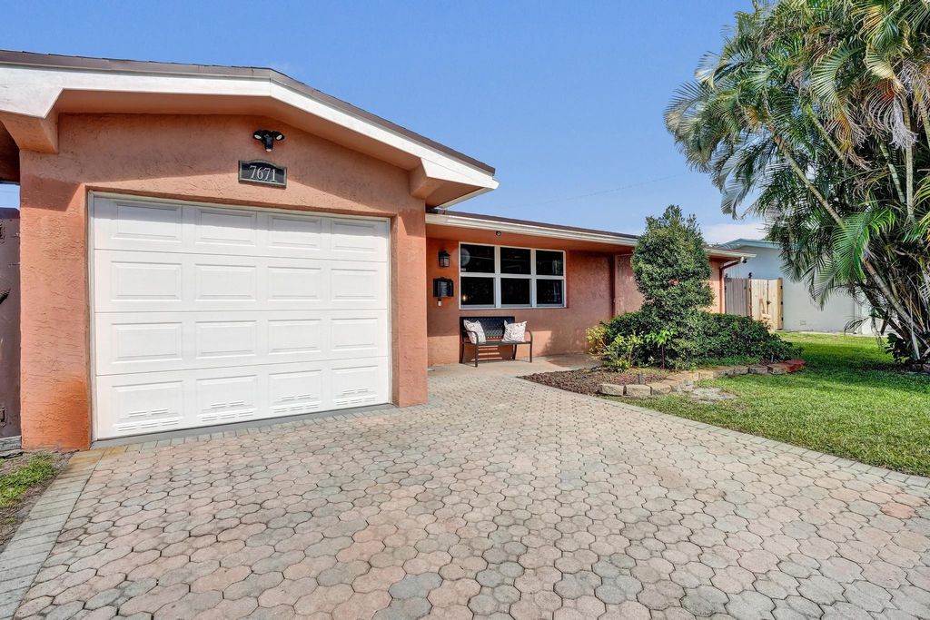 Photo of 7671 NW 15th Court, Pembroke Pines, FL 33024 (MLS # F10549501)