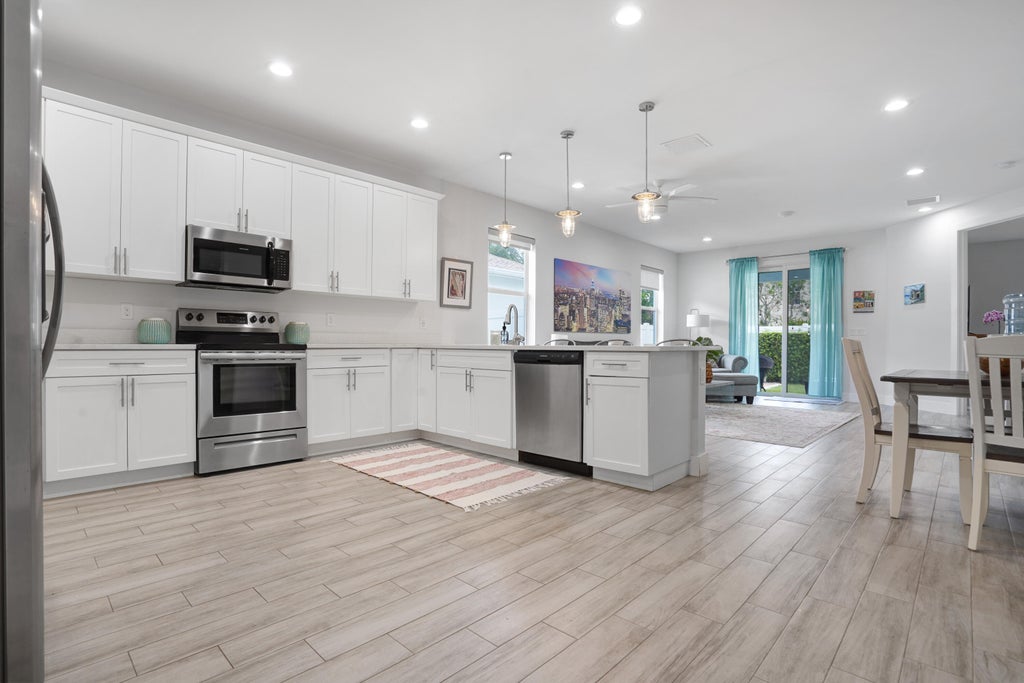 Photo of 1033 Mango Drive, Delray Beach, FL 33444 (MLS # R11124690)