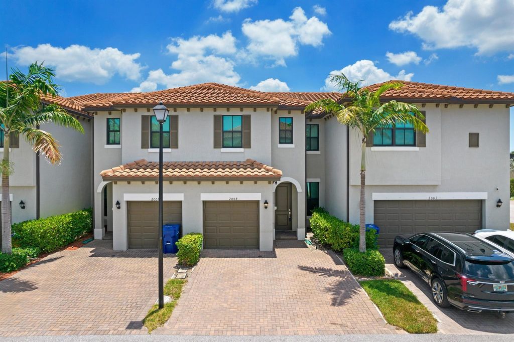 Photo of 2004 Hawksbill Place, Riviera Beach, FL 33410 (MLS # R10961309)