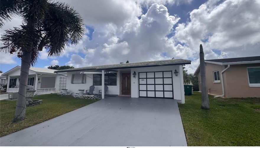Welcome to this beautifully updated waterfront single-family home located in a  55+ community in Tamarac. This charming residence features 2 bedrooms, 1 bathroom, a spacious layout, and a one-car garage. The home offers a large backyard, perfect for relaxing or enjoying the waterfront view.Both bedrooms are generously sized with ample closet space. A private in-unit laundry area is available for your convenience.The property will be available  and easy to show. Pets are negotiable.Please note: HOA approval is required. Schedule your showing today,wont last long.The listing price is $2,300 per month. The landlord is motivated.Showings are by appointment only. Schedule your private tour today — this could be the perfect fit for you! Credit score is required by HOA  730