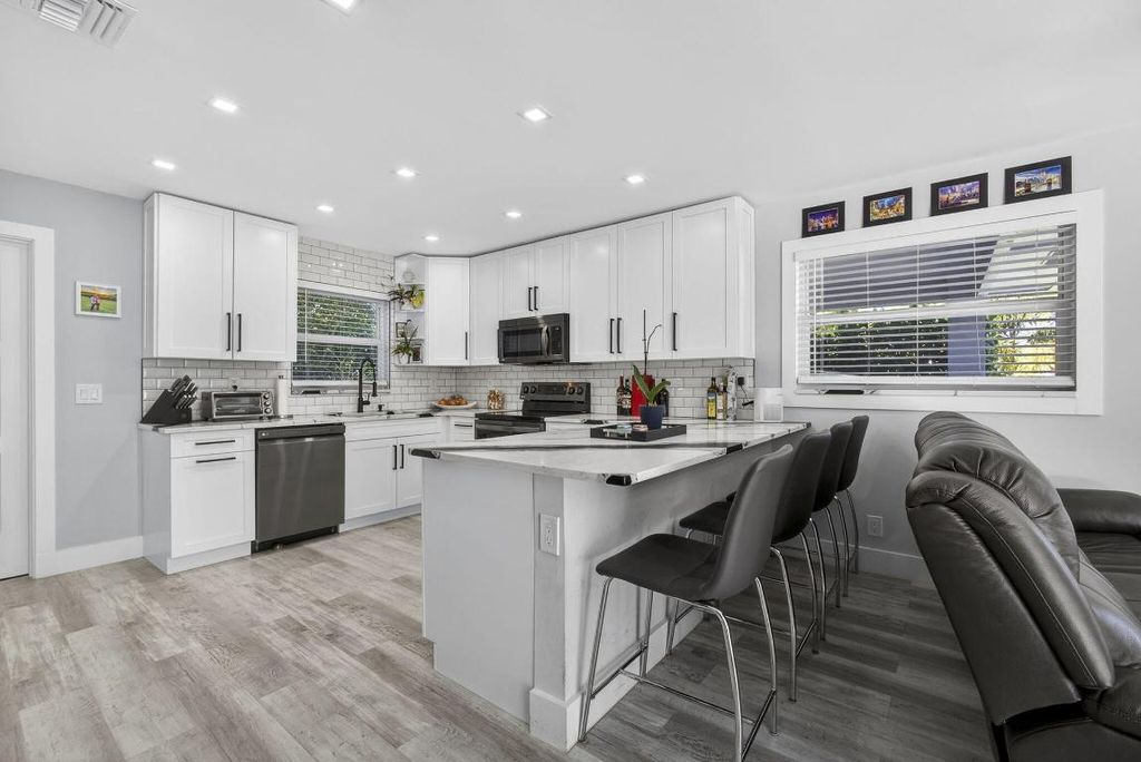 Photo of 2388 S Wallen Drive, Palm Beach Gardens, FL 33410 (MLS # R11157577)