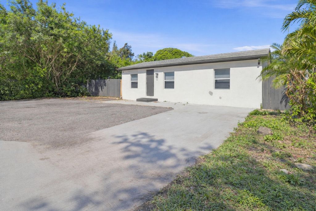 Photo of 1152 Sunset Road, West Palm Beach, FL 33406 (MLS # B26029446)