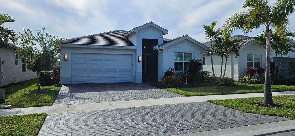 Photo of 14720 SW Surf Springs Way, Port Saint Lucie, FL 34987 (MLS # R10928215)