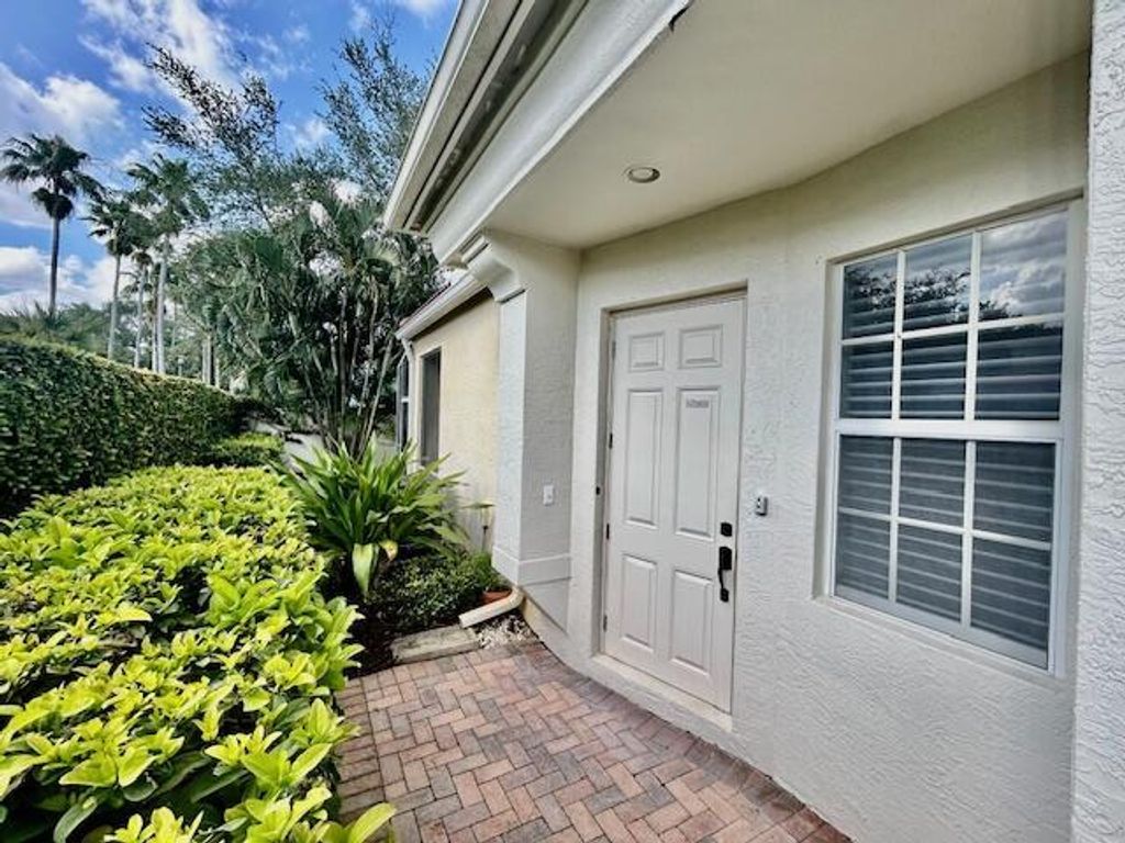Photo of 527 Commons Drive, Palm Beach Gardens, FL 33418 (MLS # R11066538)