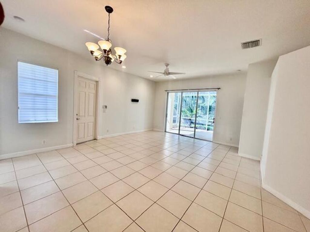 Photo of 527 Commons Drive, Palm Beach Gardens, FL 33418 (MLS # R11066538)