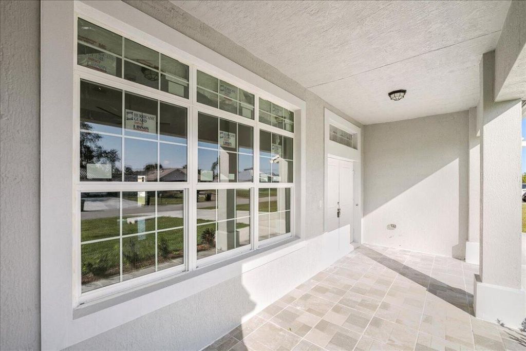 Photo of 1974 SW Cranberry Street, Port Saint Lucie, FL 34952 (MLS # R11061993)
