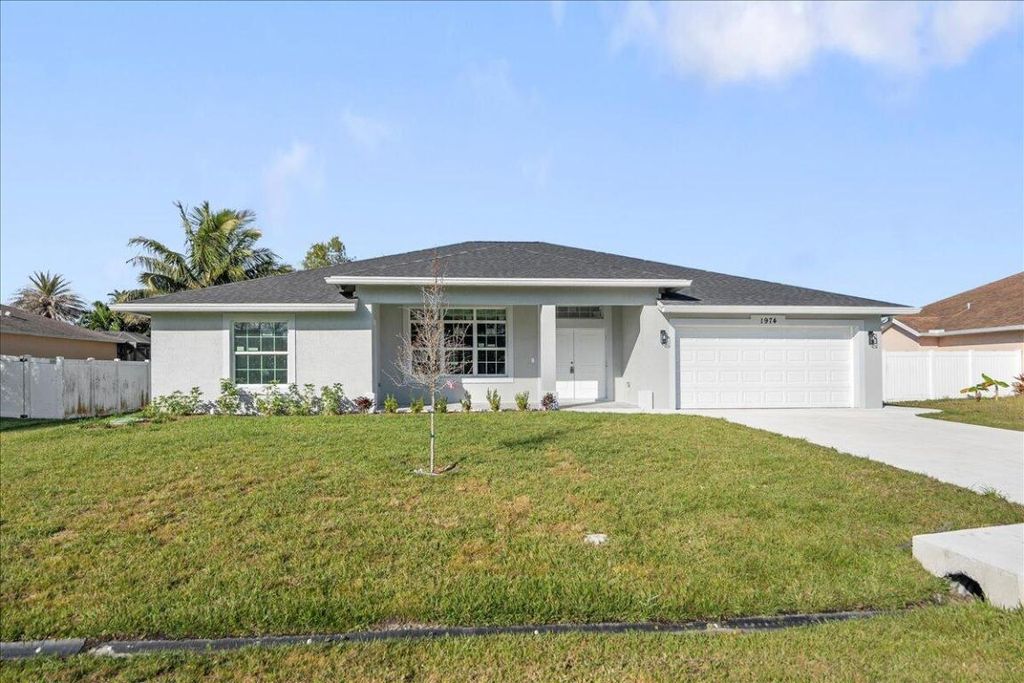 Photo of 1974 SW Cranberry Street, Port Saint Lucie, FL 34952 (MLS # R11061993)
