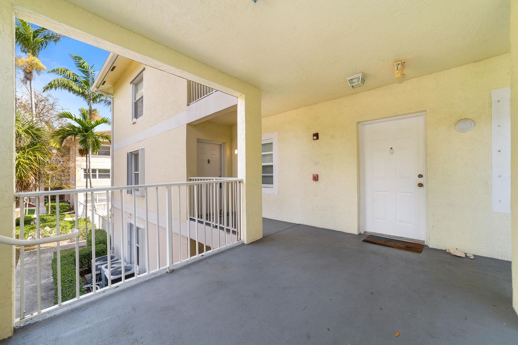 Photo of 2901 Riverside Drive #201, Coral Springs, FL 33065 (MLS # B26010809)