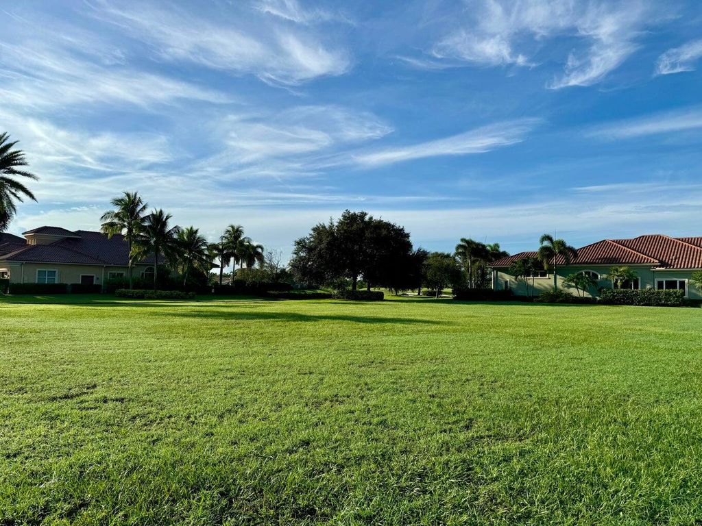 Photo of 104 SE Rio Siena, Port Saint Lucie, FL 34984 (MLS # R11159609)