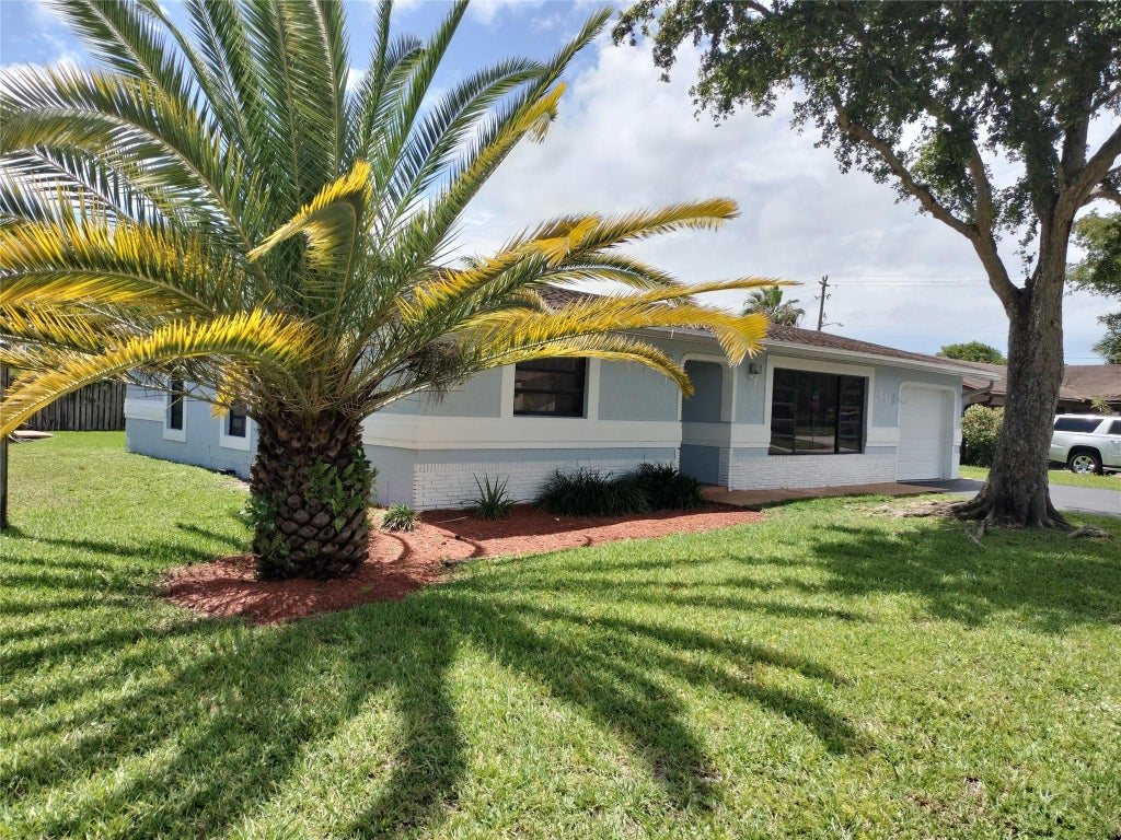 Photo of 2831 NW 51ST Terrace, Margate, FL 33063 (MLS # B26062421)