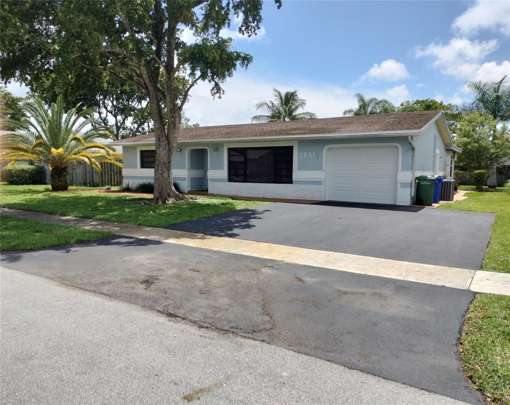 Photo of 2831 NW 51ST Terrace, Margate, FL 33063 (MLS # B26062421)