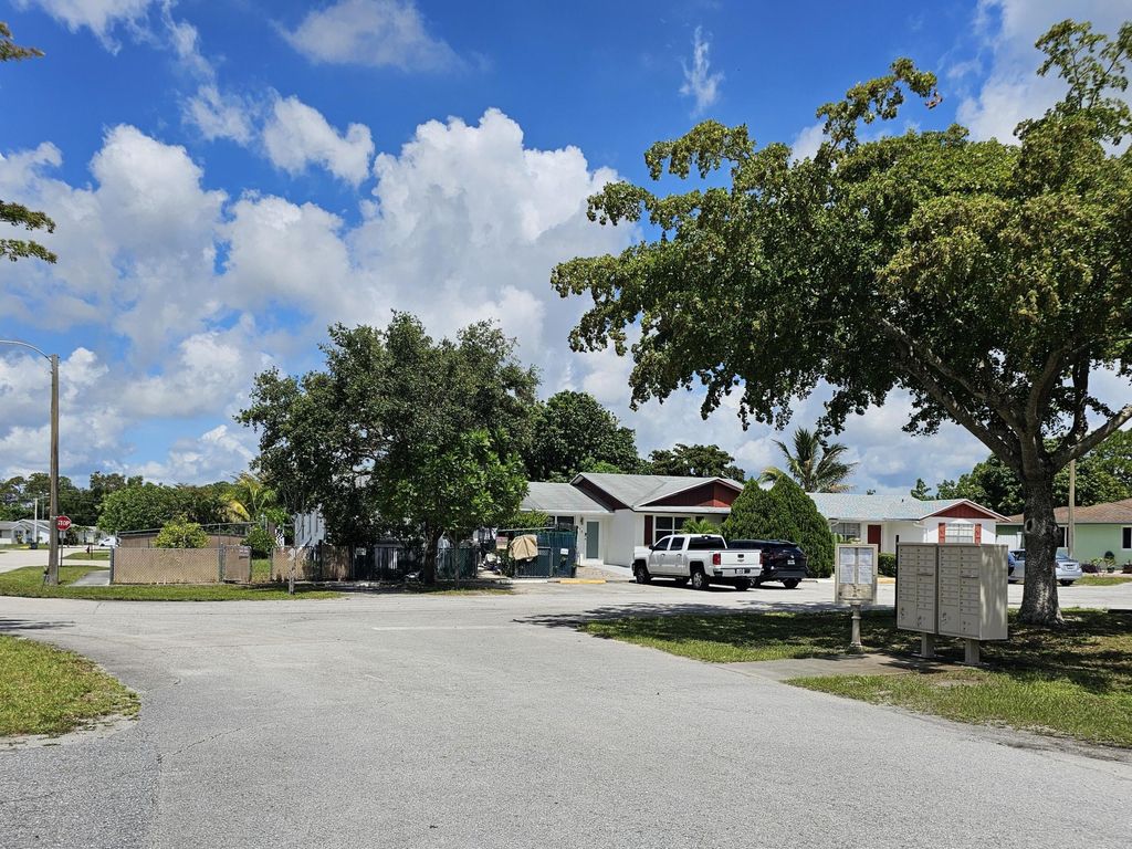 Photo of 773 E Ilene Rd Road E, West Palm Beach, FL 33415 (MLS # B26038501)