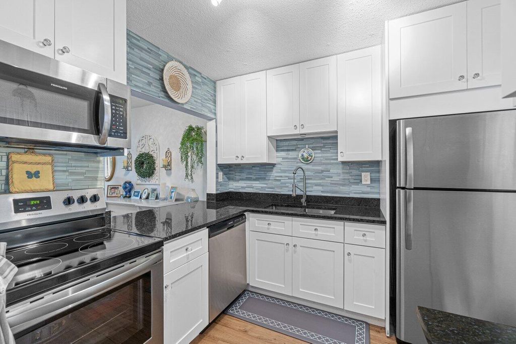 Photo of 2855 S Garden Drive #211, Lake Worth, FL 33461 (MLS # R11118664)