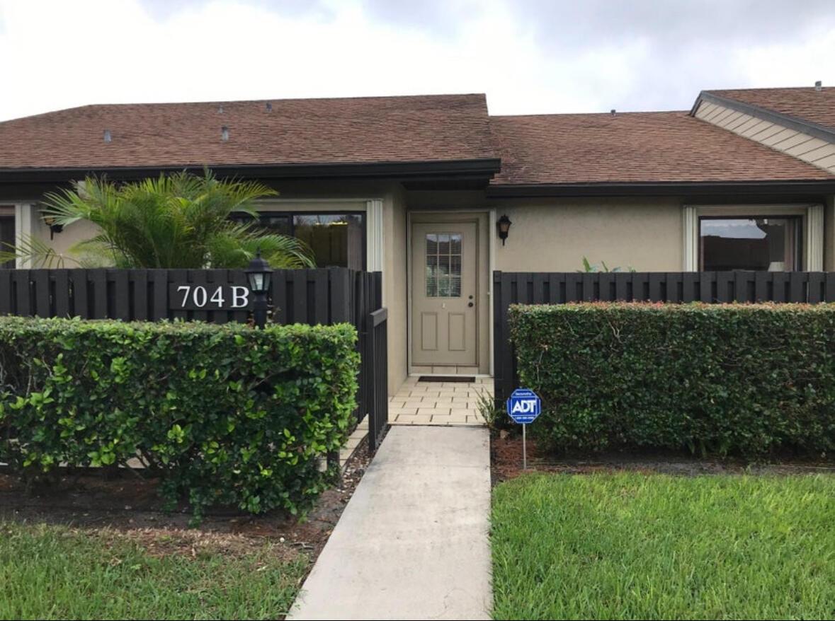 Great value for this delightful lakefront villa with large covered air conditioned patio/Florida room. Spacious floor plan with Cathedral ceilings in the living area, split bedrooms, large walk in closet. Wide plank luxury vinyl through main living areas. The eat in kitchen also has a stackable laundry section, there is an open patio in the front and pretty lake view from the back. This popular community is conveniently located near shops and restaurants and close proximity to the airport. Basic Cable is included in the rent. One pet permitted up to 25 lbs.