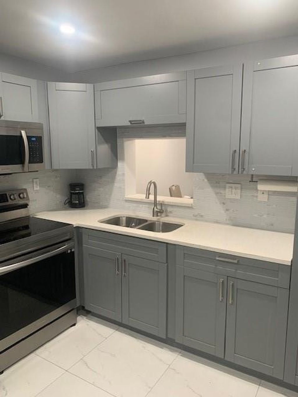 Photo of 7750 W Mcnab Road #219, Tamarac, FL 33321 (MLS # F10519778)