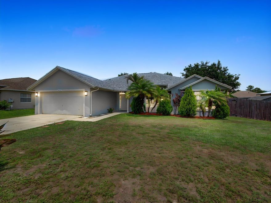 Nestled on an oversized nearly quarter-acre lot in one of Port St. Lucie's most desirable and established neighborhoods, this beautifully updated 3-bedroom, 2-bathroom pool home offers the perfect blend of modern upgrades, comfort, and outdoor living. Major improvements include a brand-new roof, heated pool with solar heating, expansive brick paver patio, and a new storage shed, providing both peace of mind and added functionality. From the moment you arrive, you'll appreciate the home's inviting curb appeal, spacious setting, and pride of ownership throughout. Inside, the home features beautiful updates and modern finishes throughout, along with a bright and open floor plan designed for both everyday living and entertaining.  Spacious living and dining areas flow seamlessly together, creating a warm and welcoming atmosphere, while the updated interior offers a truly move-in ready experience.  Step outside to your own private backyard retreat where you can enjoy Florida living year-round. The heated pool and spacious brick paver patio create the perfect setting for relaxing, entertaining guests, or enjoying peaceful evenings outdoors. The oversized lot offers plenty of room for recreation, gardening, pets, or future customization while still maintaining privacy and tranquility.  Conveniently located close to shopping, dining, parks, schools, and major commuter routes, this exceptional property combines stylish updates, practical improvements, and resort-style outdoor living in the heart of Port St. Lucie.