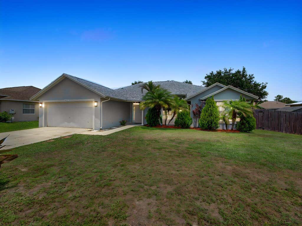 Photo of 2373 SW Santana Avenue, Port Saint Lucie, FL 34953 (MLS # B26028077)